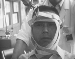 康浩郎《ドキュメント輪禍 むちうたれる者》(Bプログラム) KOH Hiroh, <i>Documenting Traffic Accidents: The Whiplashed (Document Rinka: Muchi Utareru Mono)</i> (Program B)